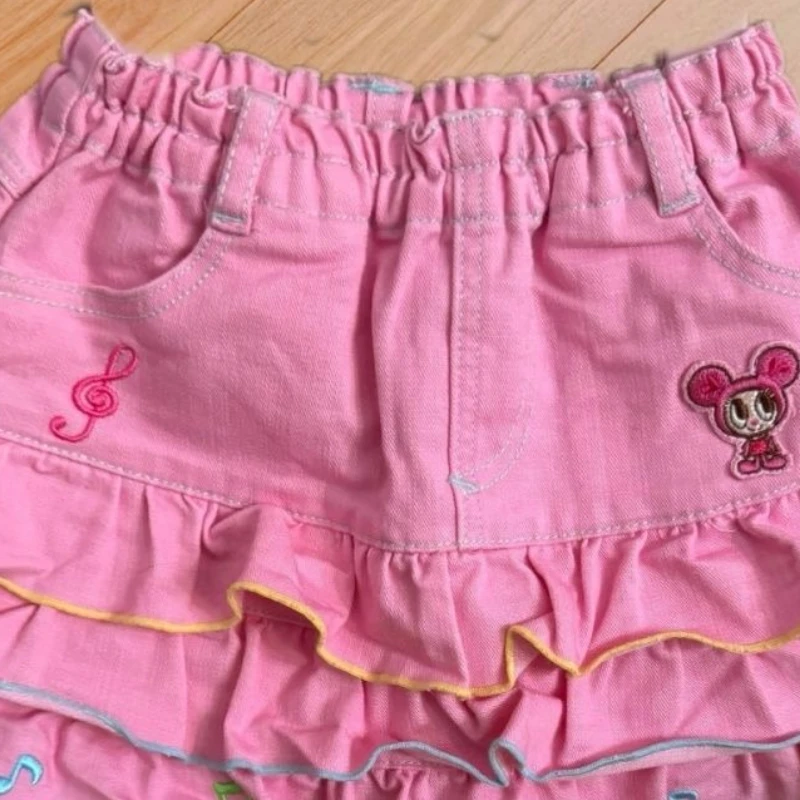 الوردي Kawaii لوليتا نمط مطوي التنانير اليابانية أزياء المرأة الحلو الكرتون الأرنب التطريز كعكة التنانير الصغيرة Y2k Faldas Mujer