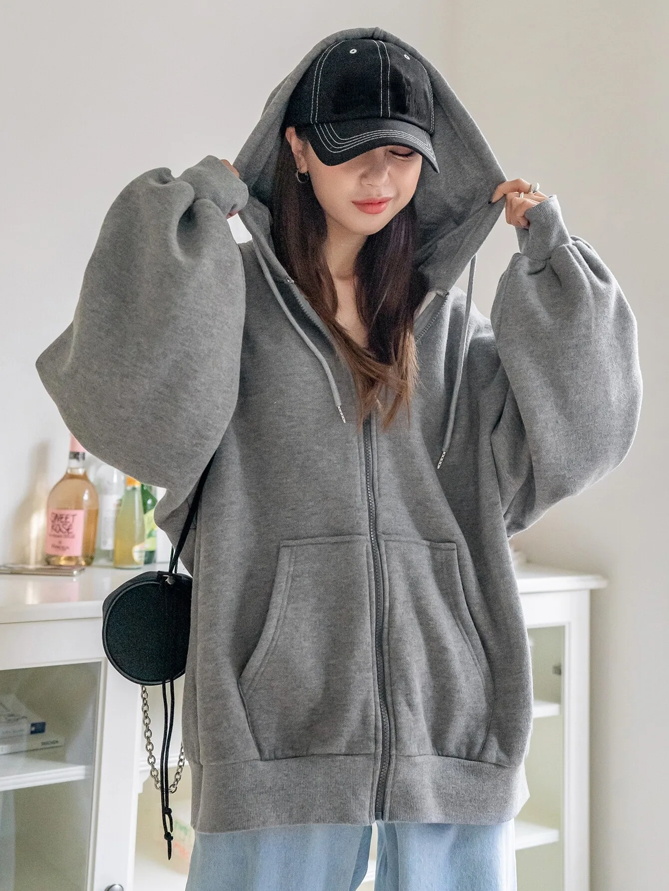 Bluza oversize z kapturem, zapinana na zamek, z obniżonymi ramionami i kieszeniami kangurkami, damska jesienna bluza dresowa.