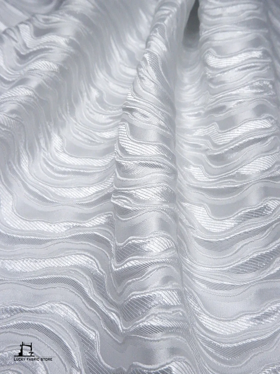 White wavy water pattern three-dimensional embossed texture gown autumn and winter jacket jacquard designer fabric