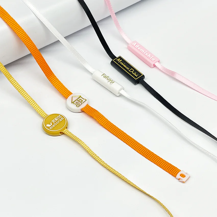 Custom 3D Embossed Plastic Hang Tag with Ribbon Lock Sustainable Waterproof Seal for Clothing & Shoes Brand Logo Tag