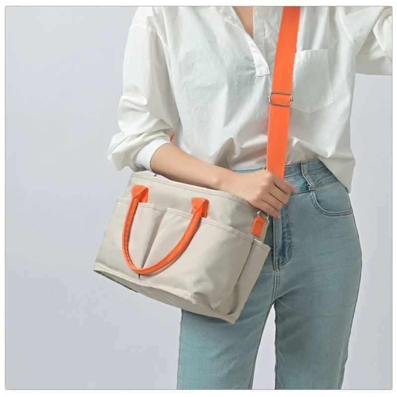 حقيبة الأم ذات السعة الكبيرة يمكن أن تكون مقطورة حقيبة الأم والطفل عصرية وخفيفة الوزن وحقيبة ساعي بكتف واحد #5