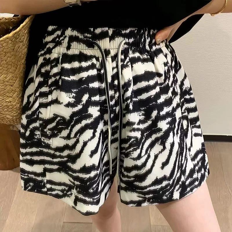 

Модные широкие короткие женские летние тонкие свободные повседневные короткие брюки с принтом зебры в Корейском стиле с высокой талией и завязками до колена