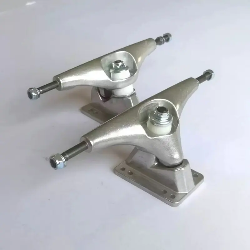 6.25in รถบรรทุกสเกตบอร์ดกระดานโต้คลื่น Surf สะพานเงินรถบรรทุกอลูมิเนียมอัลลอยด์สเกตบอร์ด