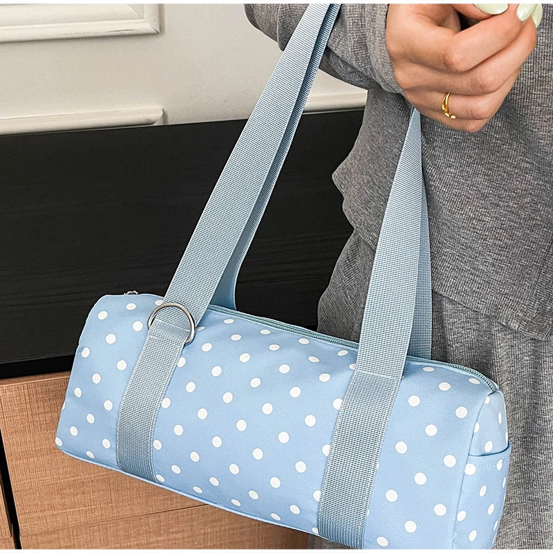 Gepunktete Schultertasche in langem Zylinderformat, Damen-Handtasche mit Tragegriff, zylindrische, leichte, schicke Tragetasche für den Arbeitsweg – Detail 22