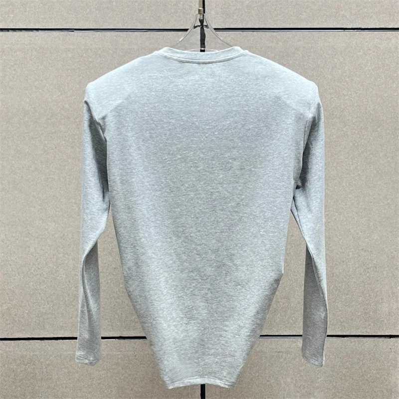 Women's t-shirt New elastic knitted slim fit women's long sleeved top for autumn 2026 Cotton blend shoulder pads corset pullover