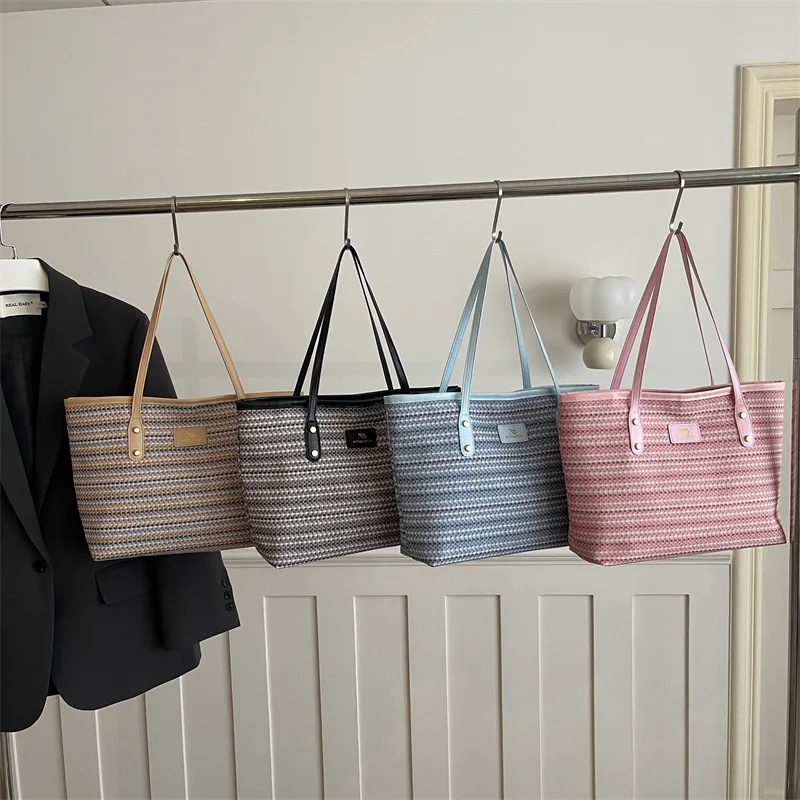 

2026 New Women's Handbag Fashion High Quality Women's Shoulder Bag Solid Color Versatile Large Capacity Women's Shopping Bag