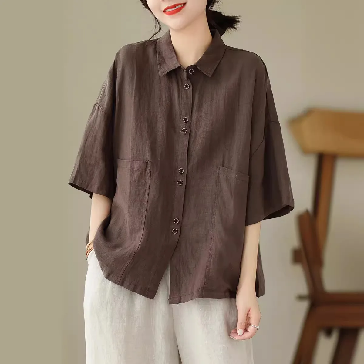 Camisa feminina de linho de algodão com bolso grande lapela manga média solta ajuste casual top agasalhos de comprimento médio