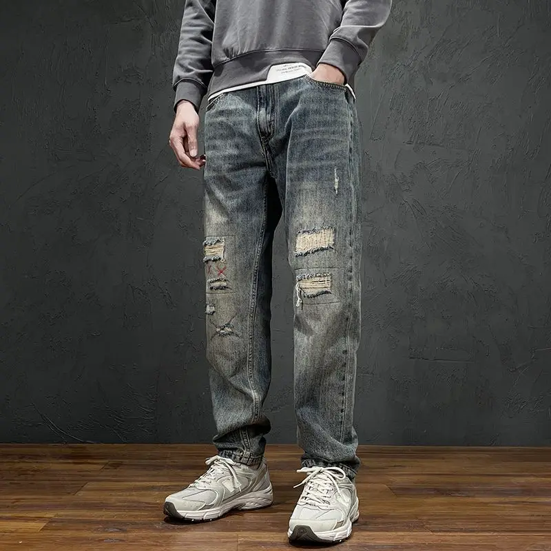 

American style beggar ripped jeans men's autumn trend straight leg pants, loose all season slimming casual men's pants