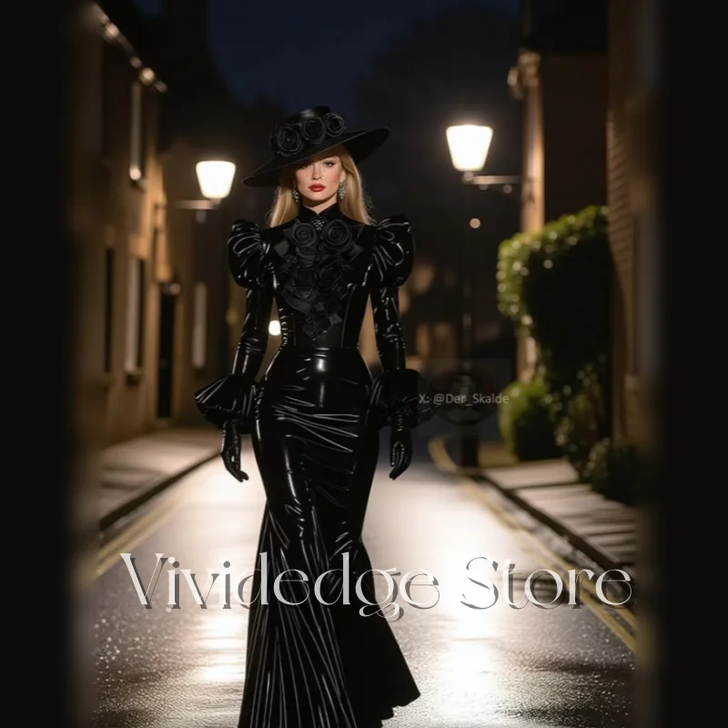 فساتين سهرة أنيقة باللون الأسود اللامع على شكل إدواردي برقبة عالية وأكمام طويلة على شكل ذيل السمكة مطوي وأرضية مخصصة للحفلات الراقصة