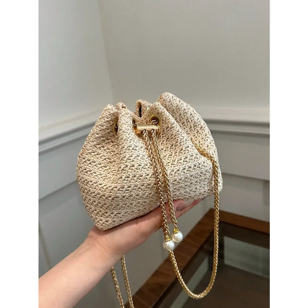 

Livesso Fashion Solid Color Hollow Out Woven Chain Drawstring Mini Crossbody Bucket Bag , Small Bags