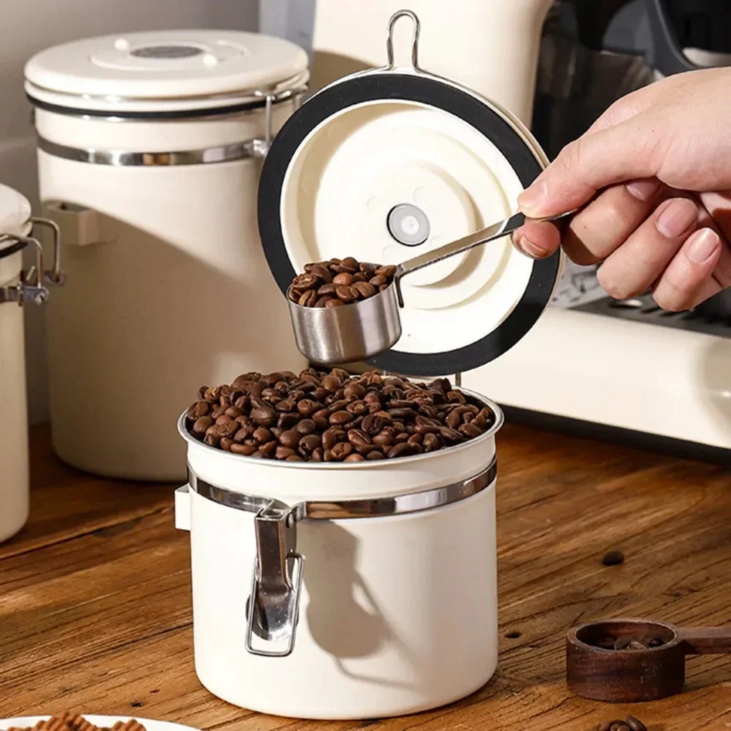 Sleek and stylish stainless steel coffee canister for preserving fresh beans and food items. Airtight design ensures flavor and