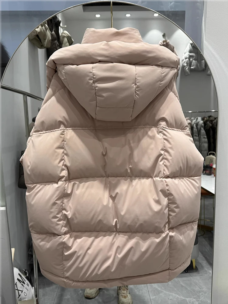 เสื้อแจ็คเก็ตขนเป็ดสีขาวสำหรับผู้หญิง รุ่นใหม่ประจำฤดูหนาวปี 2025 ความยาวปานกลางถึงยาว  แบบอเนกประสงค์ หนา หลวม ทันสมัย และให้ความอบอุ่น