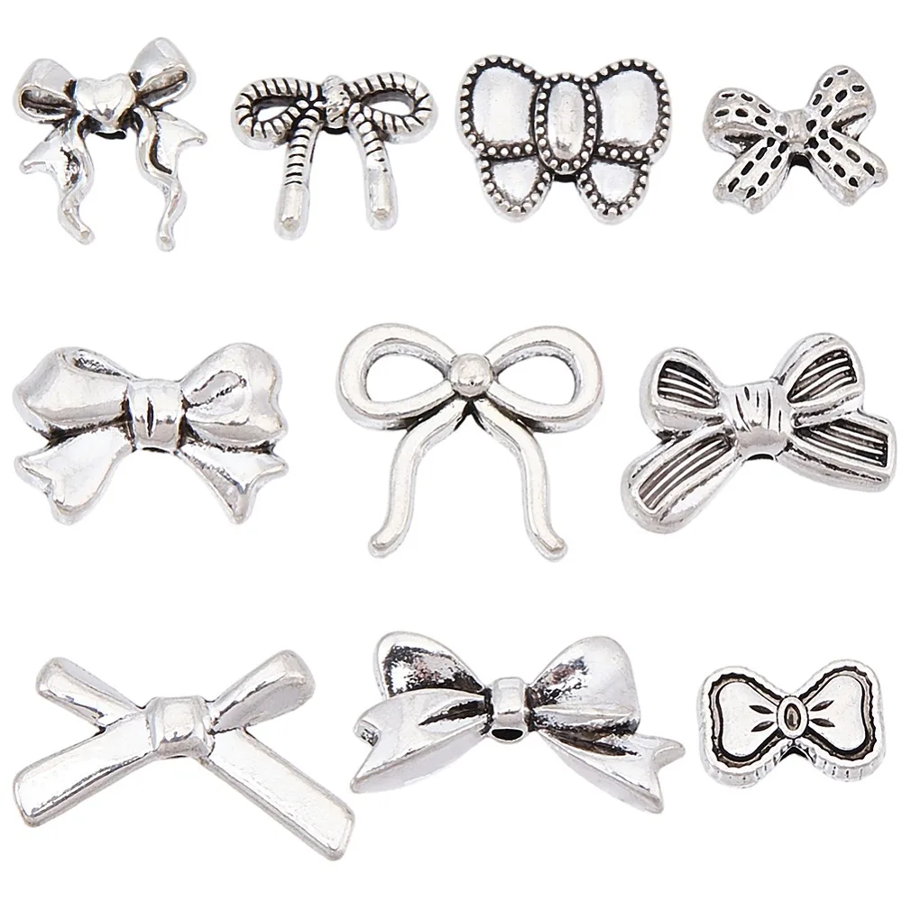 

100Pcs 10 Styles Style Alloy Beads Bowknot Silver 7~13.5x10~19.5x3~5mm Hole: 1.2~1.8mm 10pcs/style