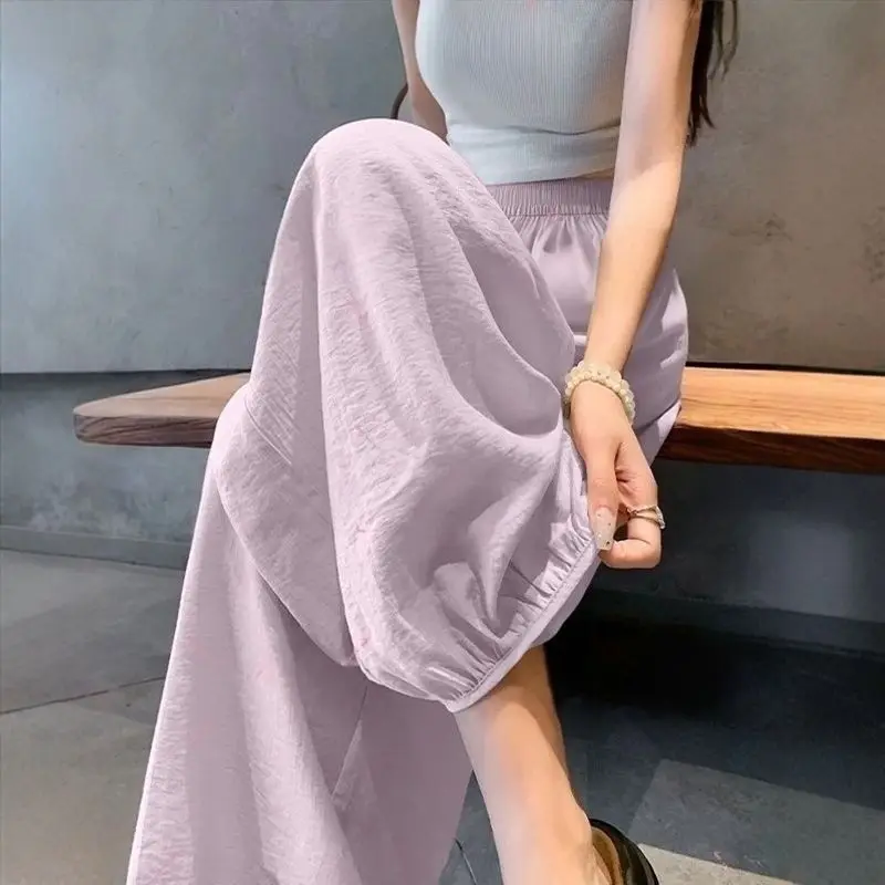 

Элегантные абрикосовые свободные шаровары для женщин, осенние уличные шикарные прозрачные брюки с эластичной резинкой на талии, осенние повседневные расклешенные длинные брюки 2025