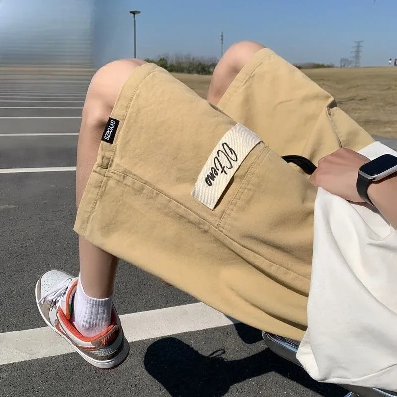 Solto cintura elástica meio sólido largo com bolsos shorts de carga dos homens bermuda calças curtas para homens desenhar corda longo baggy y2k strech
