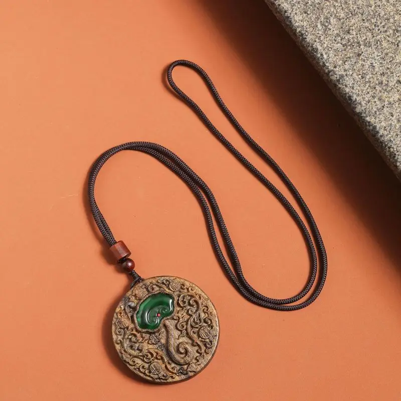 Natural agarwood inlaid with a Ruyi amulet for peace and fortune, auspicious cultural pendant, hand-carved neck hanging ornament
