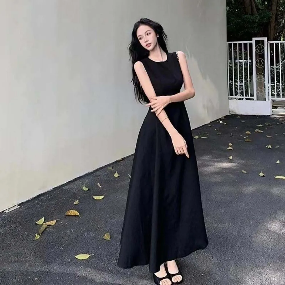 Ins Fashion U الرقبة بلا أكمام فستان طويل مزاجه سترة دون أكمام بلون تنورة طويلة ألف خط طويل المرأة فستان كوري الطرف
