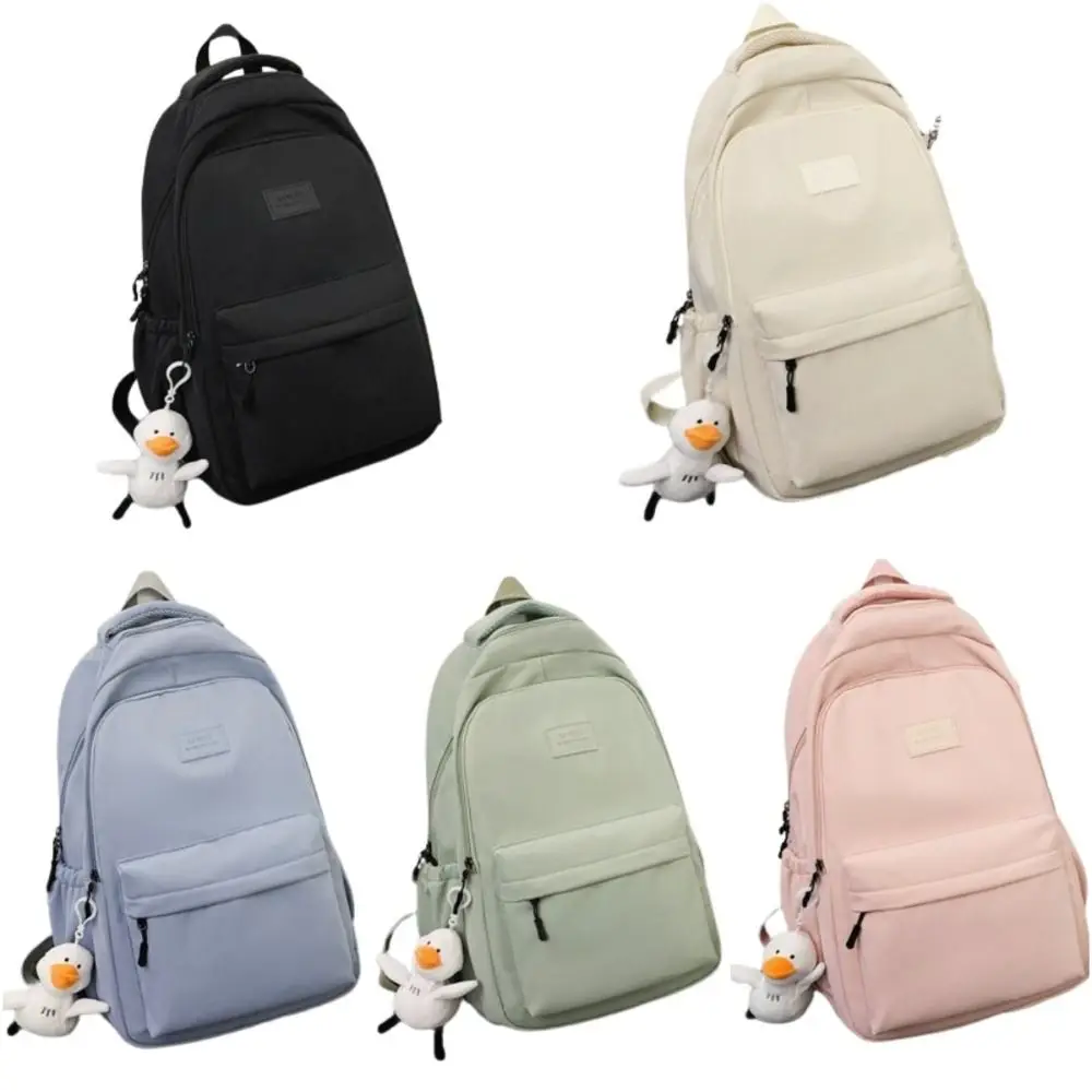 Presente pato pingente cor sólida mochila estilo coreano bolsa estudantes saco de armazenamento saco de ombro à prova dwaterproof água viagem