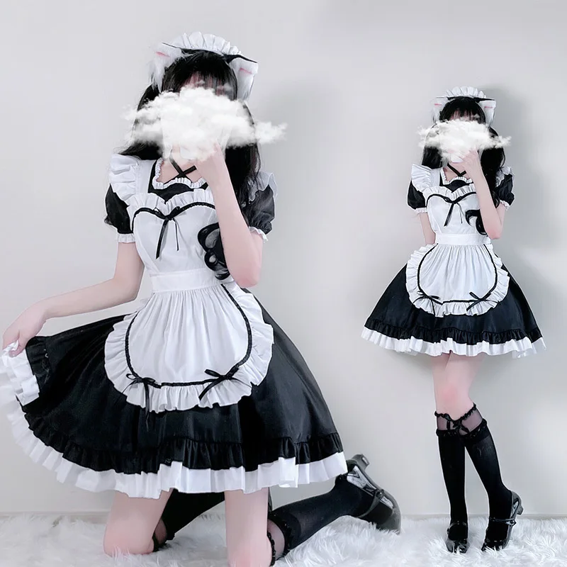 Traje de sirvienta japonesa en blanco y negro, disfraz de Anime, vestido de Lolita, falda de cómic Sexy bonita