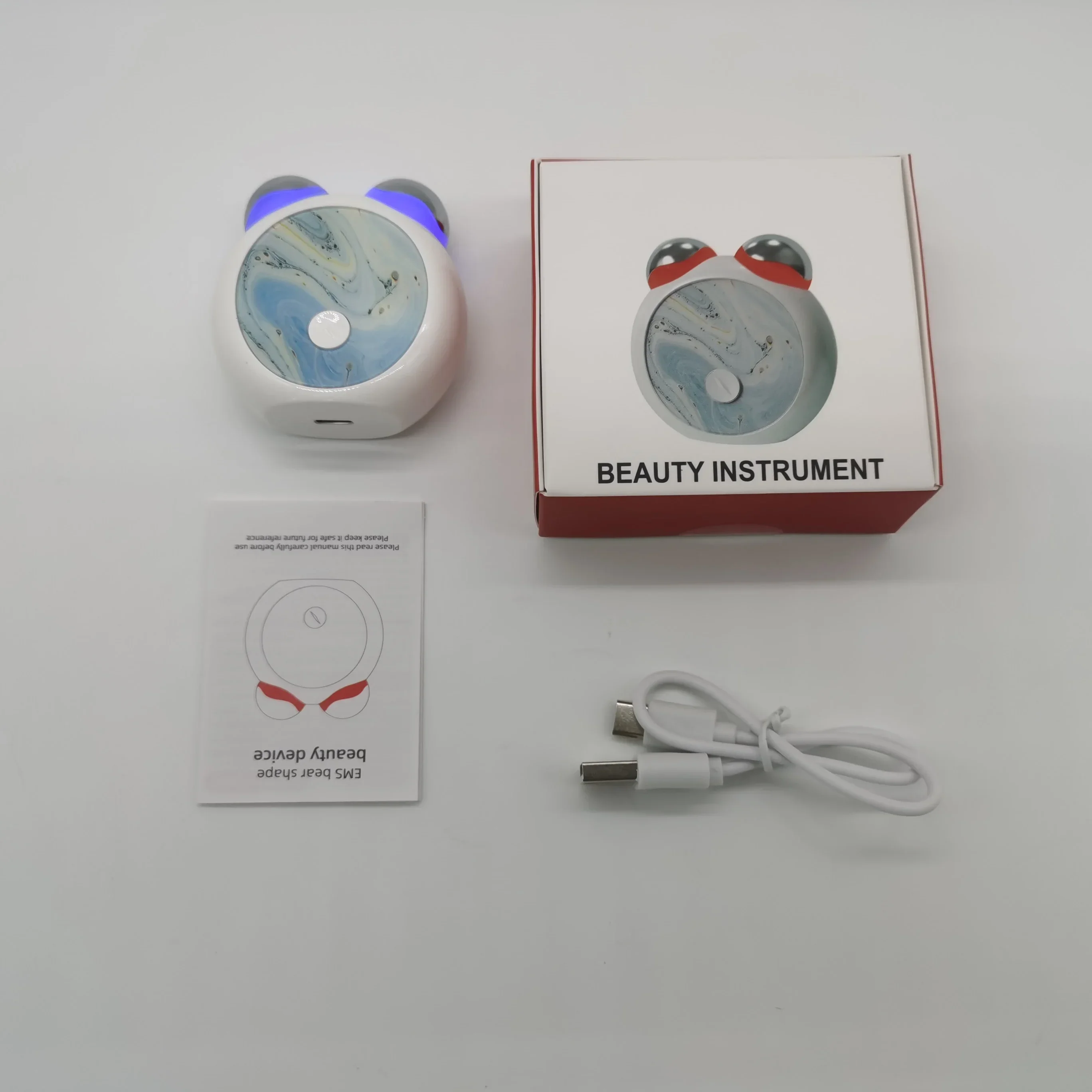 جهاز صغير محمول باليد للوجه مكركرنت EMS Q-Bear أسطوانة تدليك كهربائية LED جهاز تجميل الاهتزاز للعناية بالبشرة