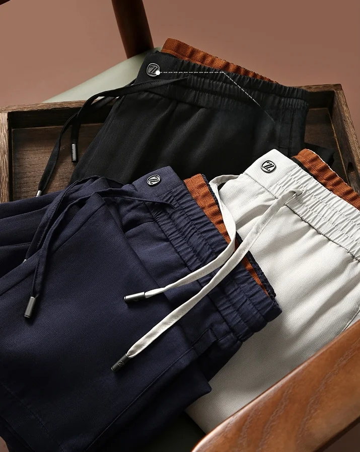 

Роскошные импортные льняные мужские брюки с эластичной талией и прямыми штанинами, повседневные брюки для весны и лета, новая модная городская молодежная модель