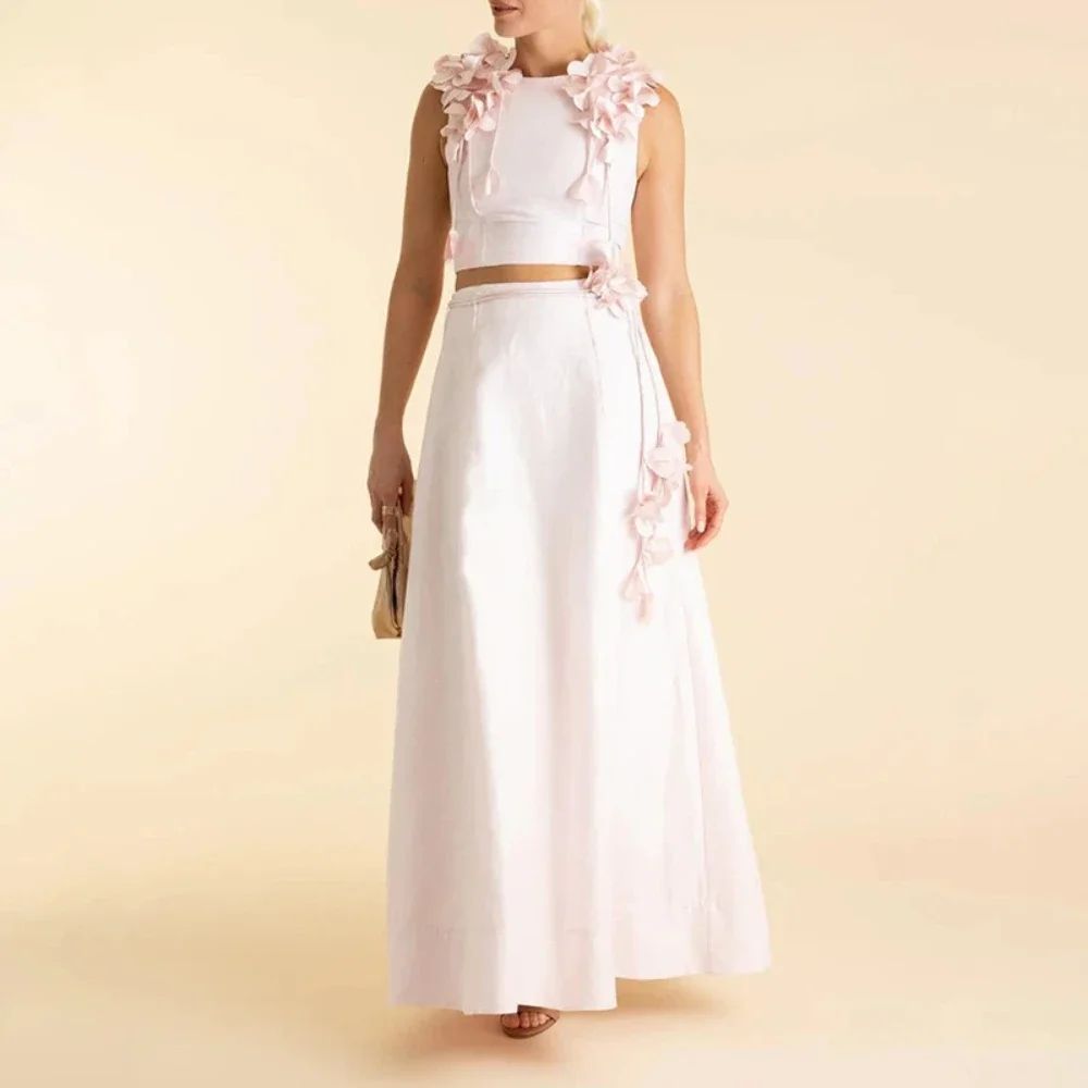 

Модный комплект из двух предметов с 3D-цветочным декором для женщин: укороченный топ без рукавов с круглым вырезом и длинная юбка с завышенной талией. Новинка.