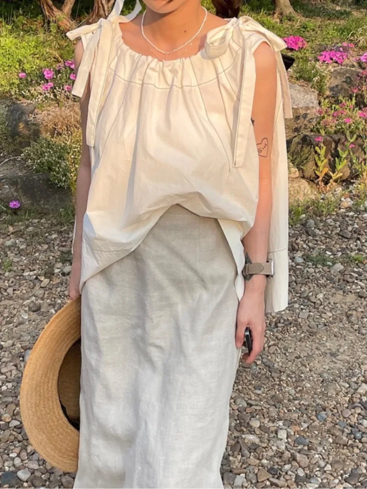 レトロエレガントなノースリーブシャツ女性の夏の新しい甘い蝶結びショルダーストラップルーズ多用途トップ快適なフィット感