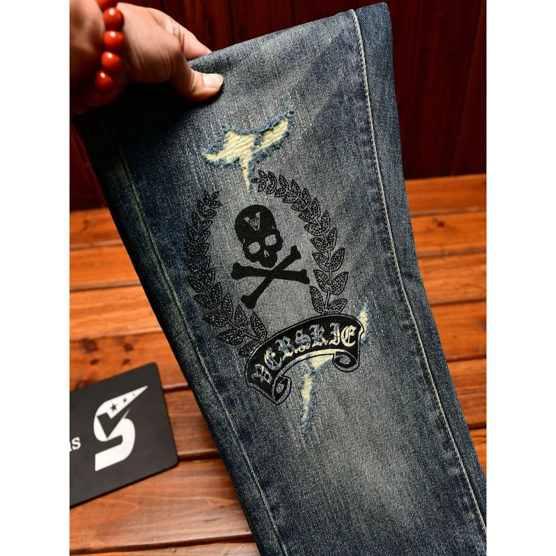 

High end jeans men with ripped holes, street fashion prints,, small feet, elastic, retro and handsome pants