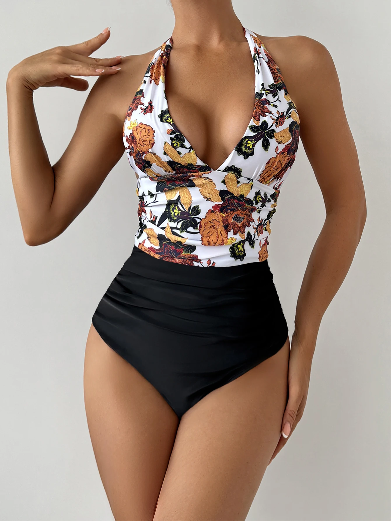 

Women's Floral Print One-Piece Swimsuit Deep V Neckline Tie Straps Side Pleats Contrasting Pants
