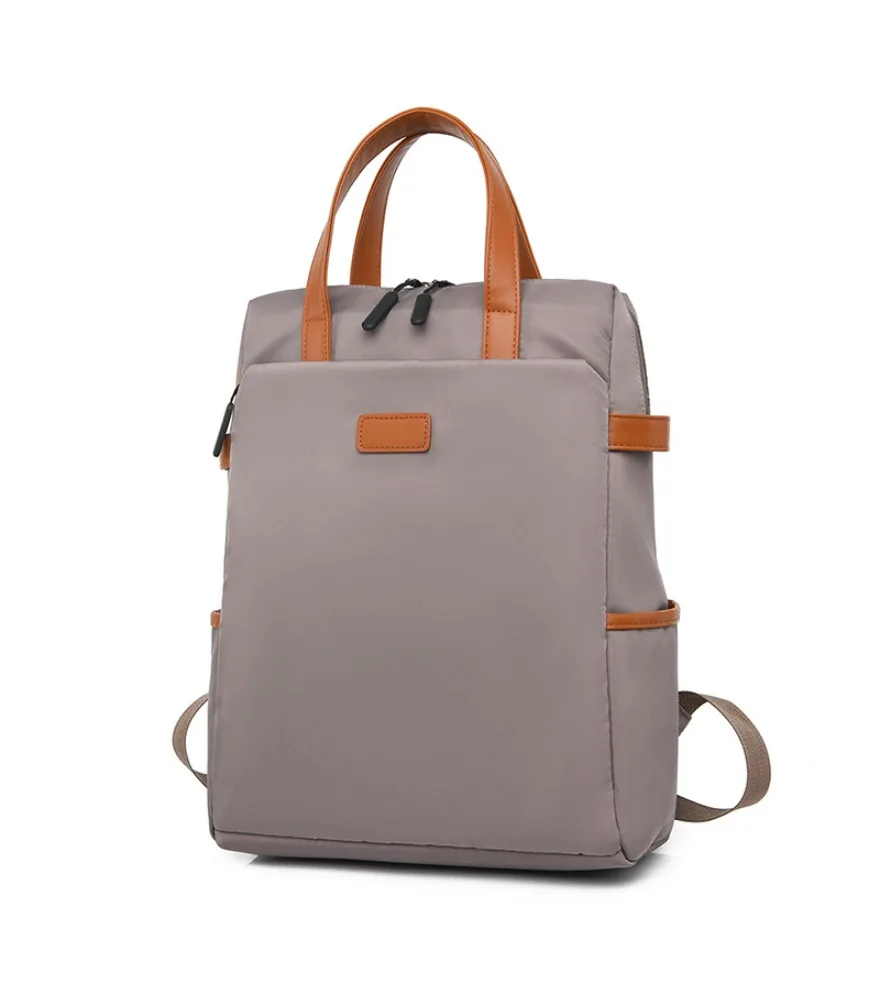 The backpack can be set with a tie rod the computer backpack is fashionable and the female office worker is simple.