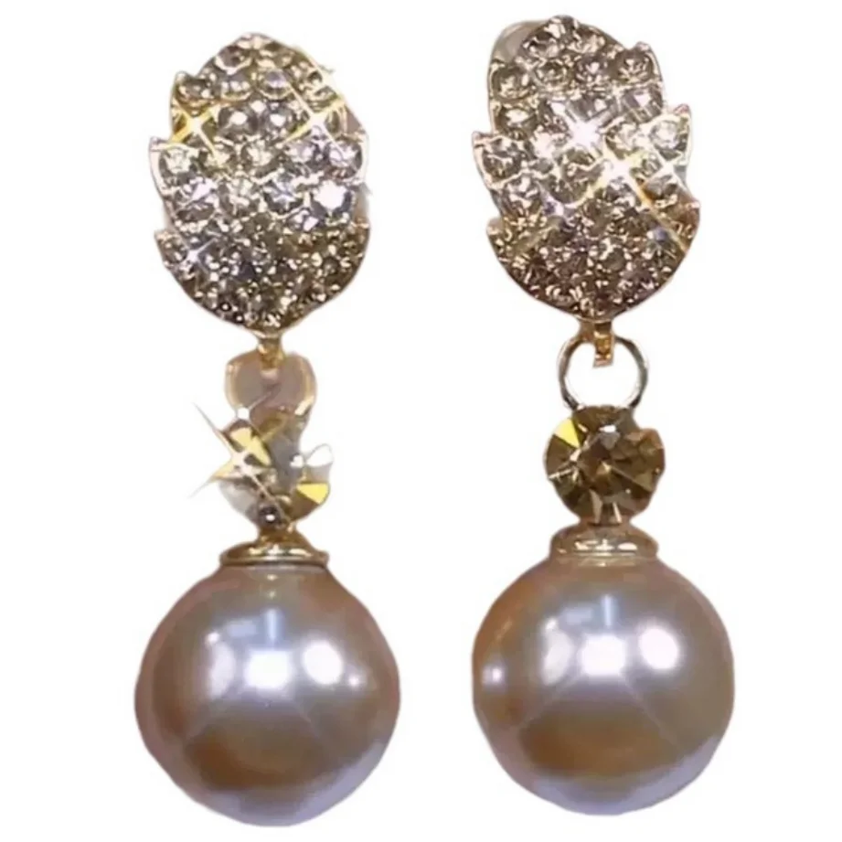 

Очаровательная пара круглых висячих сережек с розовым жемчугом Южного моря диаметром 10 мм.