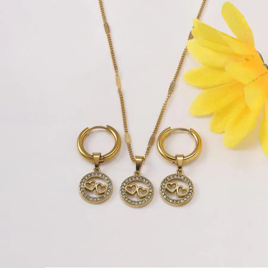 

Fashionable new diamond studded full core stainless steel pendant necklace earring set for women