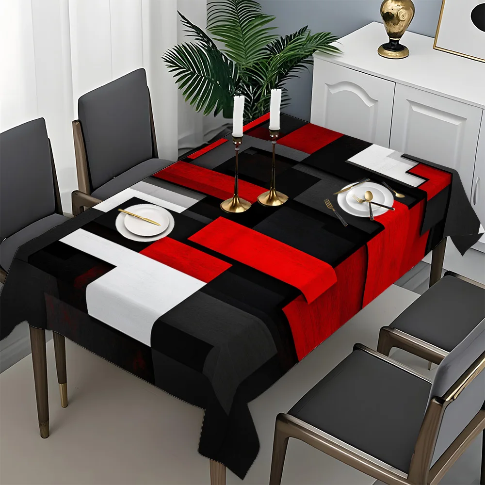 A single-color geometric tablecloth, featuring a red and black block pattern design, creates a warm atmosphere.zyc