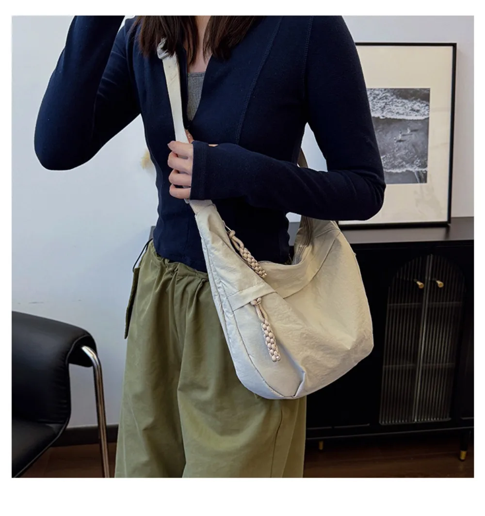 Neue Canvas-Umhängetaschen mit großer Kapazität, koreanische schlichte Sport-Hobos-Tasche, einfarbige leichte Dumpling-Tasche für Reisen – Detail 11
