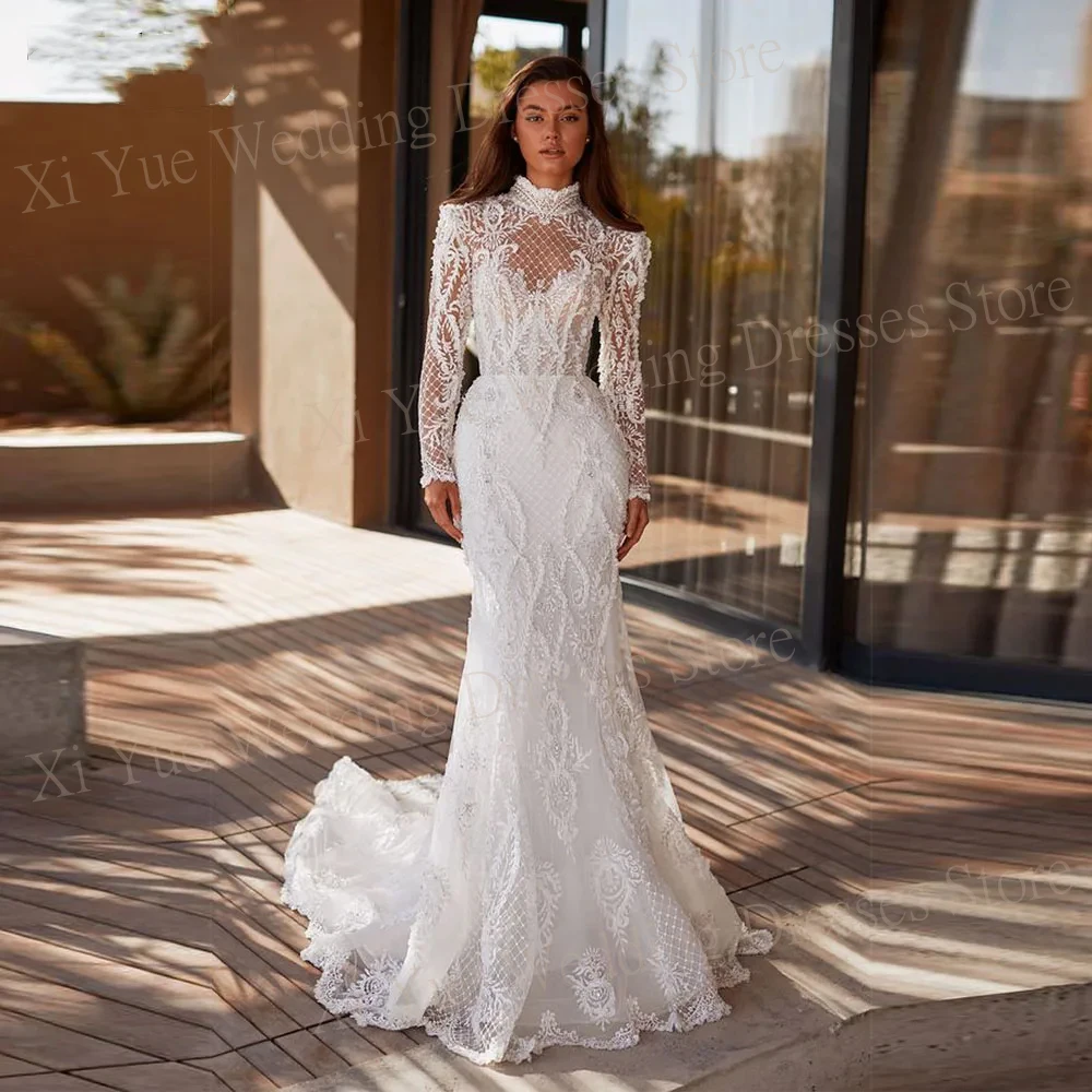 Nuovi squisiti abiti da sposa generosi a-line Appliques di pizzo indietro con bottoni Illusion abiti da sposa collo alto manica lunga sirena