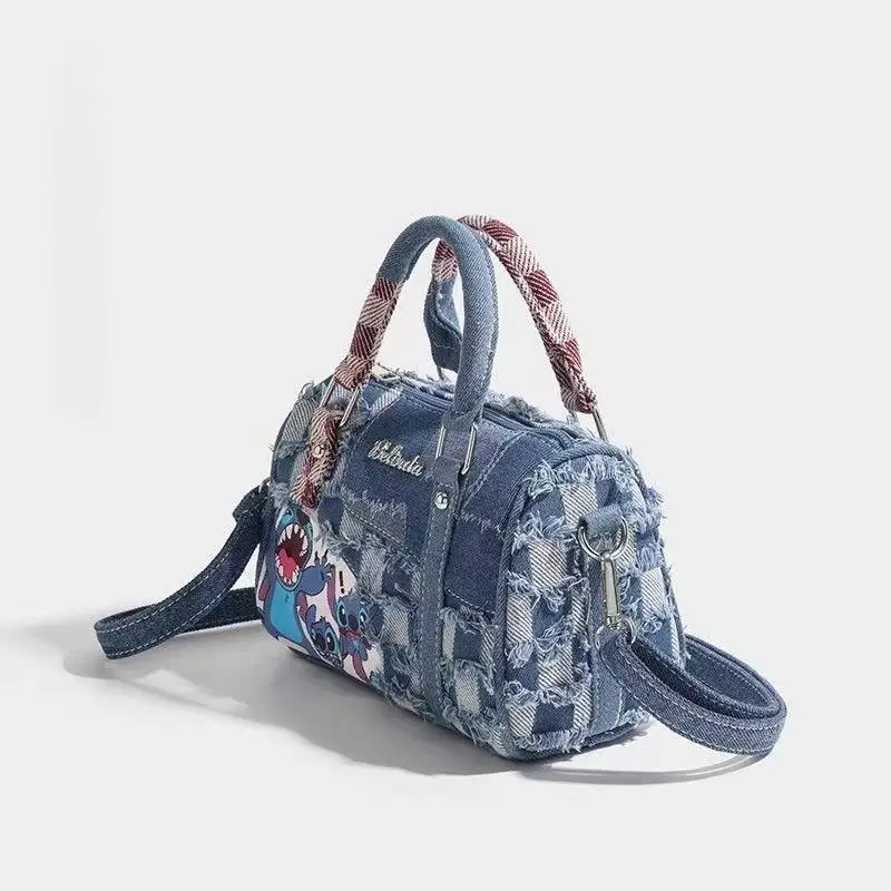 Zerrissene Denim-Tasche mit Cartoon-Stich, gespleißte diagonale Kreuztasche, handgehaltene Kissentasche, Denim-Boston-Tasche