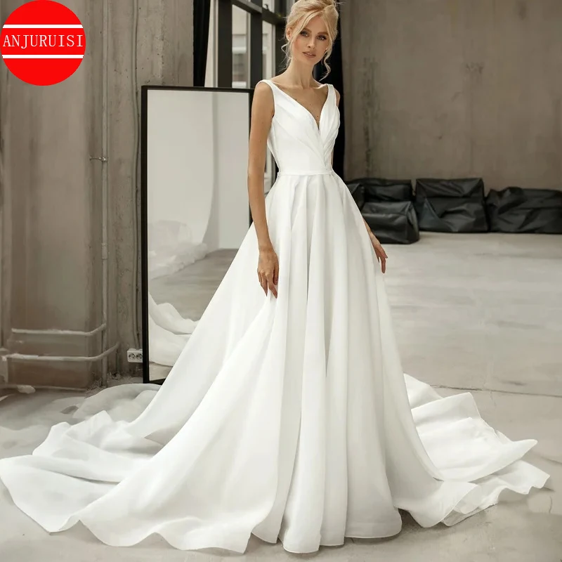 

Dramatic Pleated A-line Wedding Dress with Deep V-neckline Charming Bridal Gown with Lace-up Back And Court Train for Women