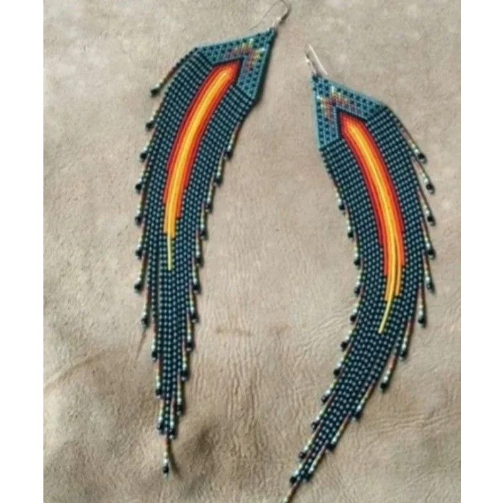 

Серьги из рисовых бусин в богемном стиле. Украшение. Универсальная индивидуальность. Геометрия. Кисточка. Симметрия. Серьги из бисера ручной работы.