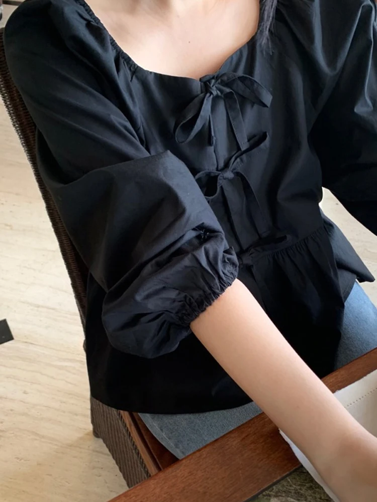 トレンドの半袖ロングシャツ レディース 春の新作 デザインセンス ボウタイ ルーズ バブルスリーブ ラウンドネック 無地シャツ