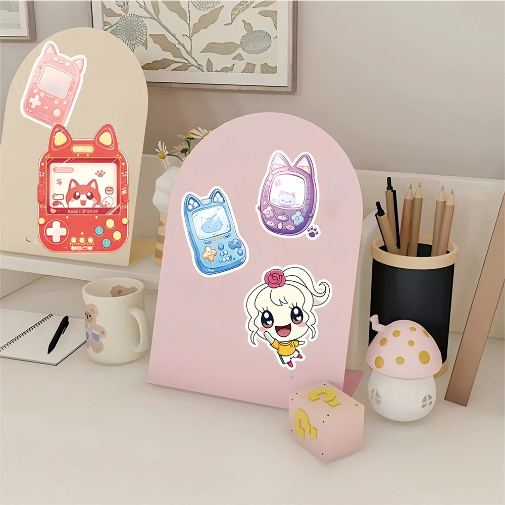 10/30/50 قطعة Kawaii Tamagotchi الحيوان الكتابة على الجدران ملصقات لطيف الكرتون شخصية ملصق محمول الأمتعة الهاتف الشارات لعبة الديكور