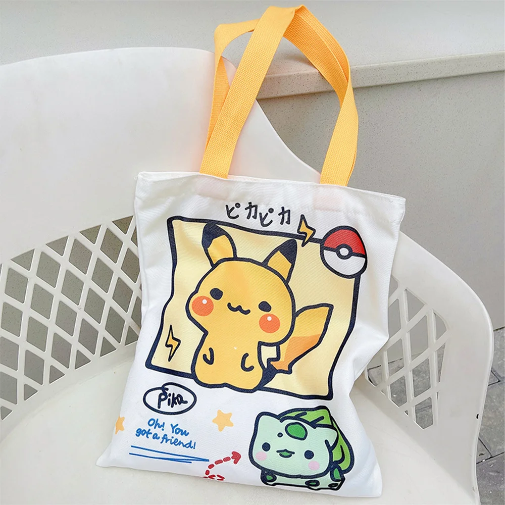 

Pokemon Canvas Tote Bag Cute Pikachu Squirtle Psyduck Cartoon Anime Shoulder Handbag for Girls Birthday Christmas Holiday Gifts