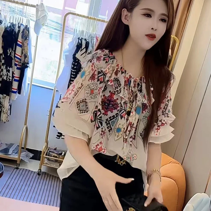 Fashion Slash Neck Printed Lace Up Bow Ruffles Blouses Women Clothing 2024 Summer New Loose Casual Tops Butterfly Sleeve Shirts