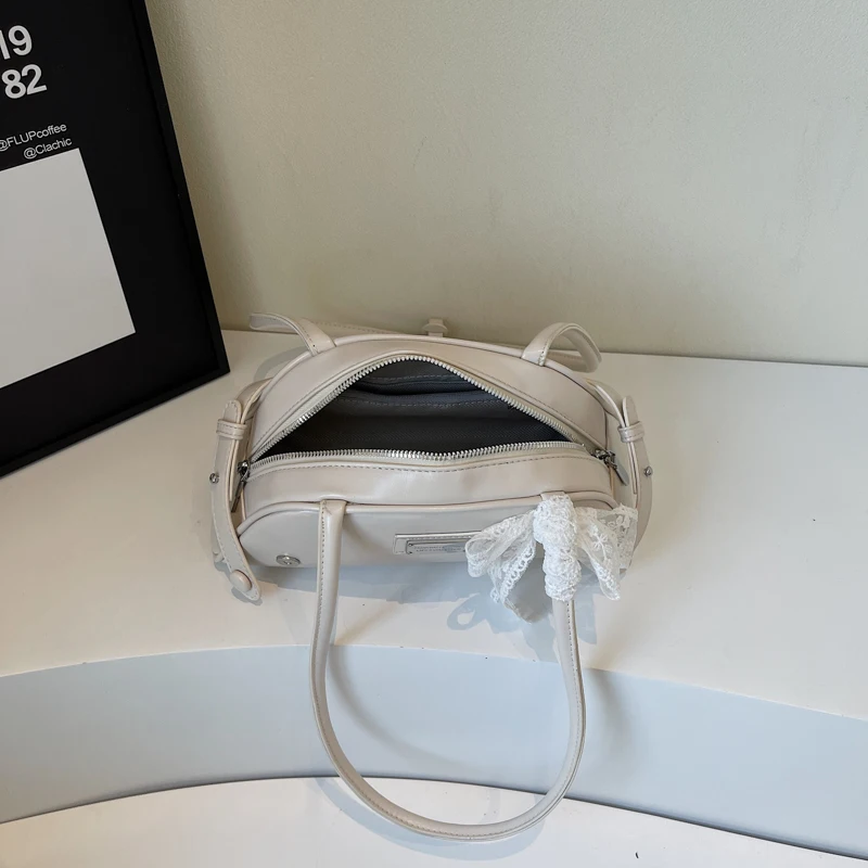 المرأة حقيبة كتف بسيطة بولي Leather الجلود القوس الترفيه الإبط حقيبة يد بلون السفر تحت الإبط حقيبة يد الفتيات في الهواء الطلق حقيبة يومية