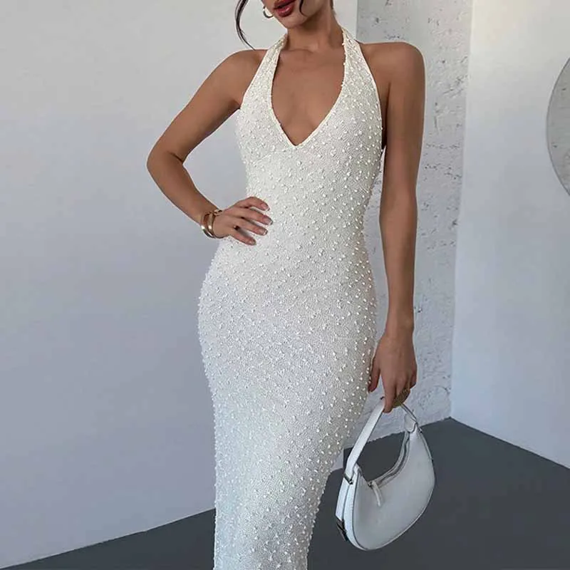 Summer new fashion temperament, advanced elegance, classic V-neck backless design, hanging neck, summer long dress, female sexy