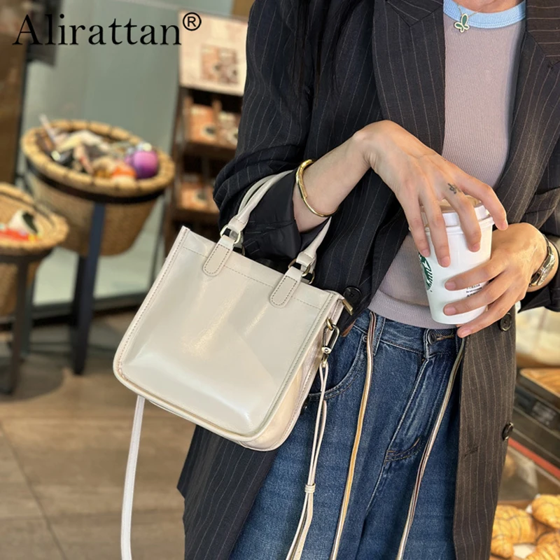 

Alirattan Genuine Leather Commuting Women's Bag 2024 Summer New Single Shoulder Crossbody Bag Square Handheld Women's Bag