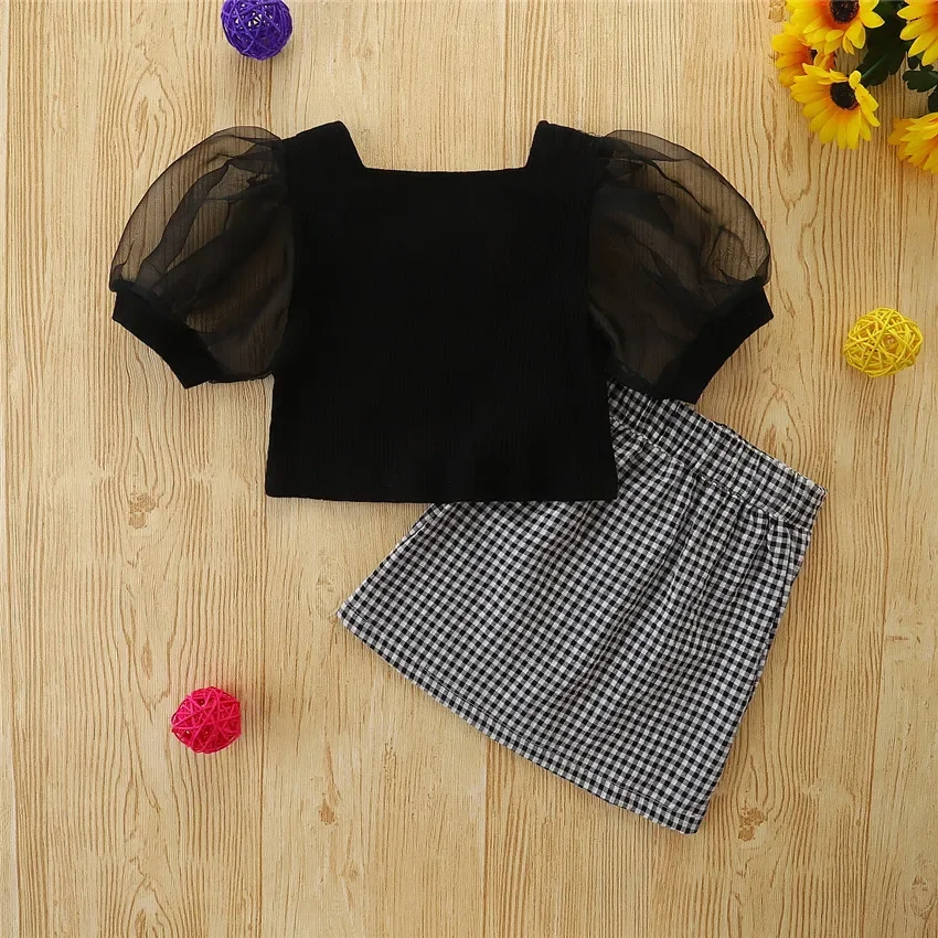 Children's clothing ins Europe and the United States summer girls skirt suit puffy sleeve top + thousand  lattice skirt