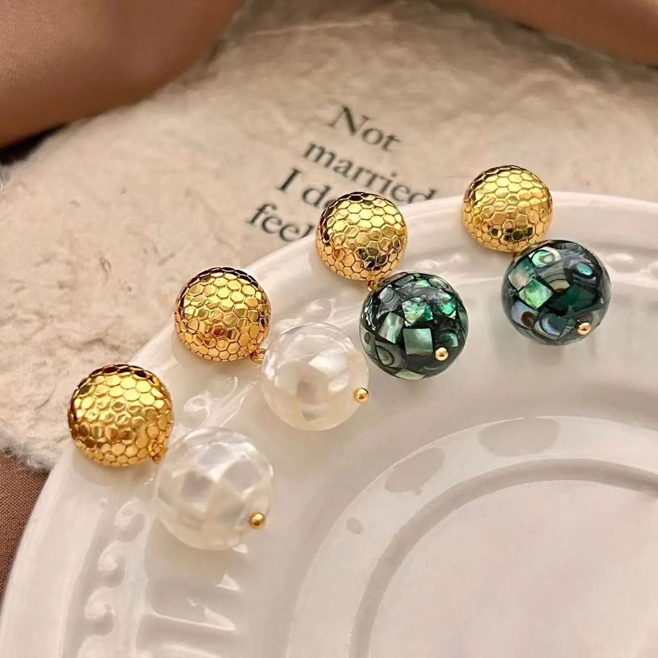 Light luxury niche design double-sided ball earrings, abalone fritillary splicing, high-end commuting versatile women's earrings