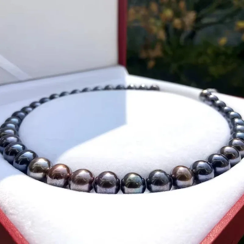 

Натуральный черный жемчуг 11–12 мм, серебряная застежка 925 пробы