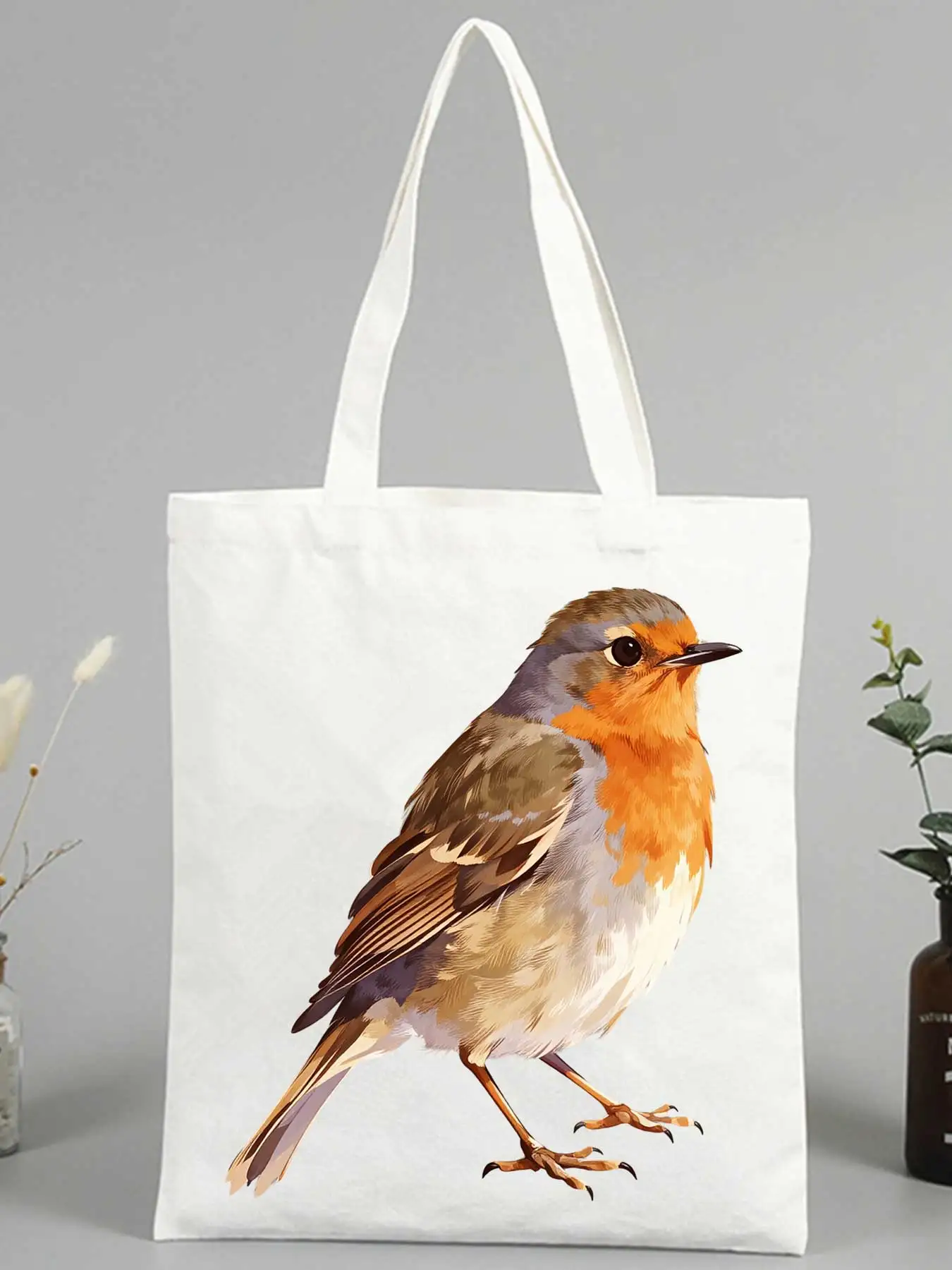 bird graphic canvas tote bag with nature-inspired design, ideal for daily shopping and casual outings