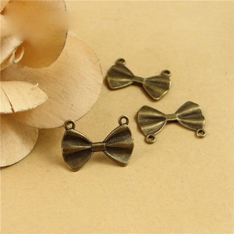 

100 шт./лот DIY микс ювелирных изделий аксессуары сплав ретро банты в форме разъемы подвески подвеска для телефона